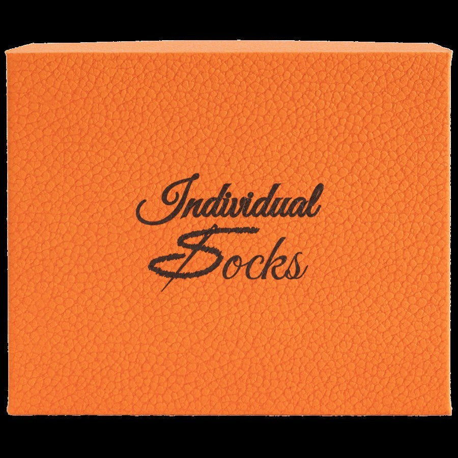 regalo di Natale all'ultimo minuto: gift pack Individual Socks pronto accanto alla scatola di spedizione